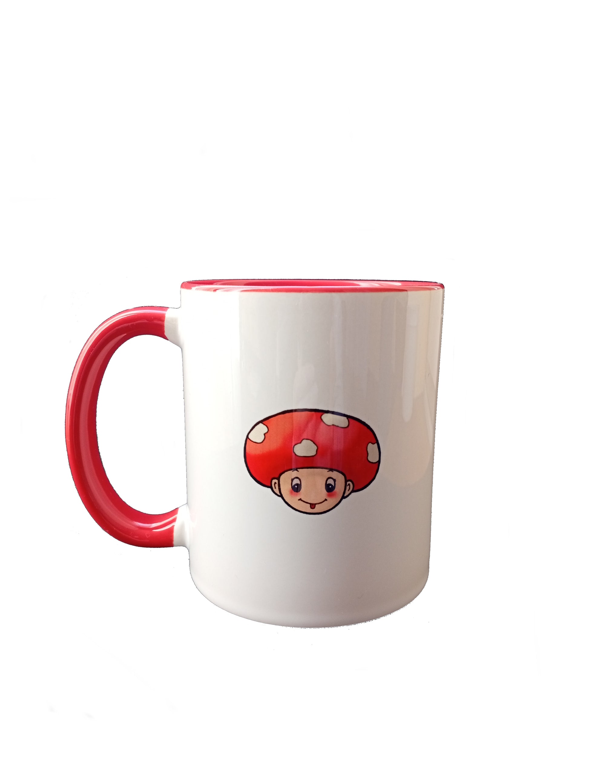 White ceramic mug with red handle, red rim, and cute mushroom cartoon design