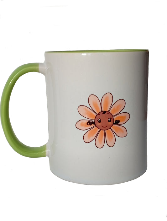 White ceramic mug with green handle and rim, featuring a cute smiling flower illustration
