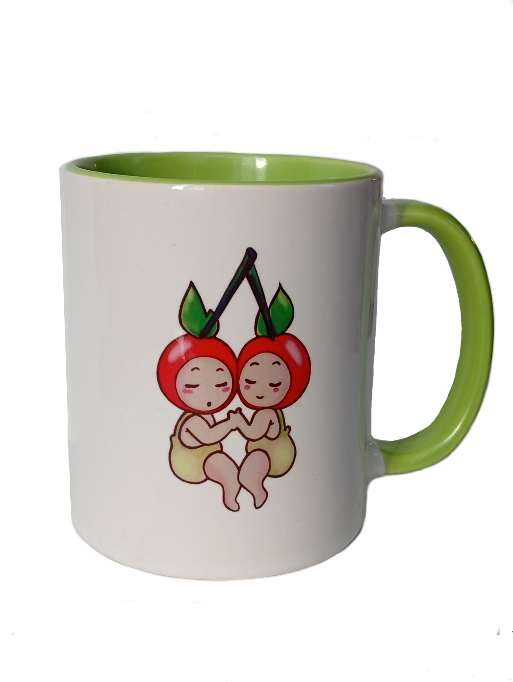 White and green mug with cute cherry baby cartoon illustration on front