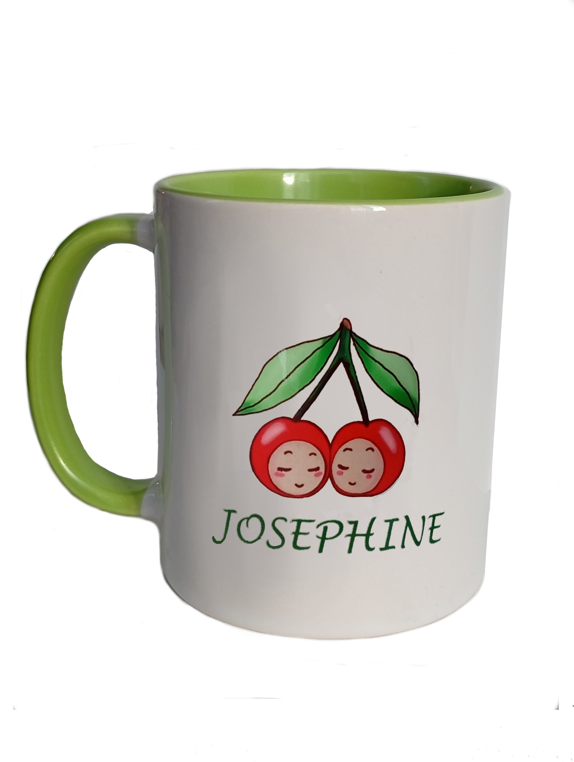 White ceramic mug with green handle, cherry illustration, and JOSEPHINE text