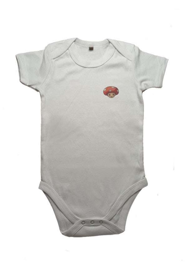 White baby onesie with red mushroom print on chest, short sleeves, snap closure bottom