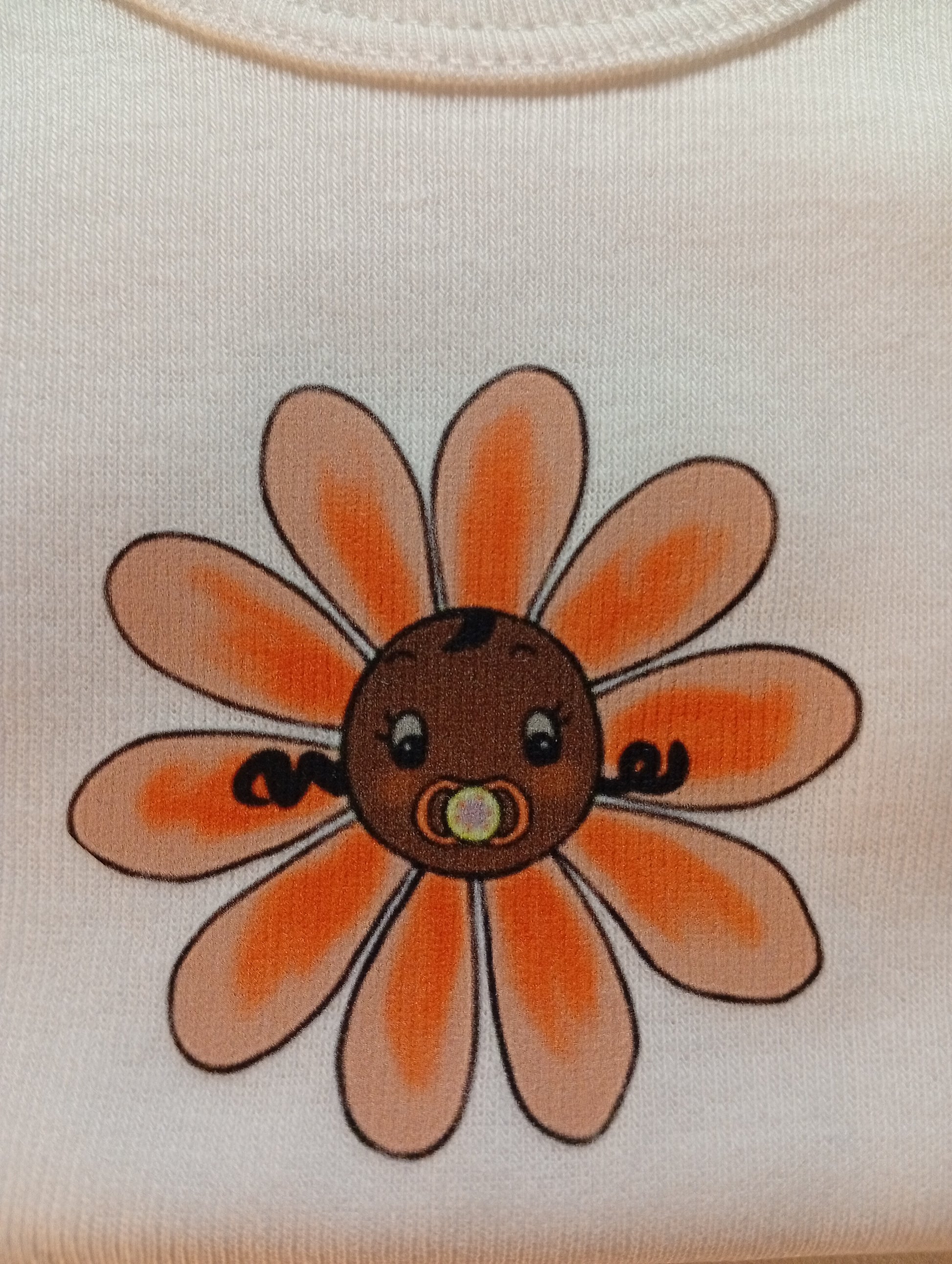 Cute daisy logo with baby face and pacifier on white fabric background