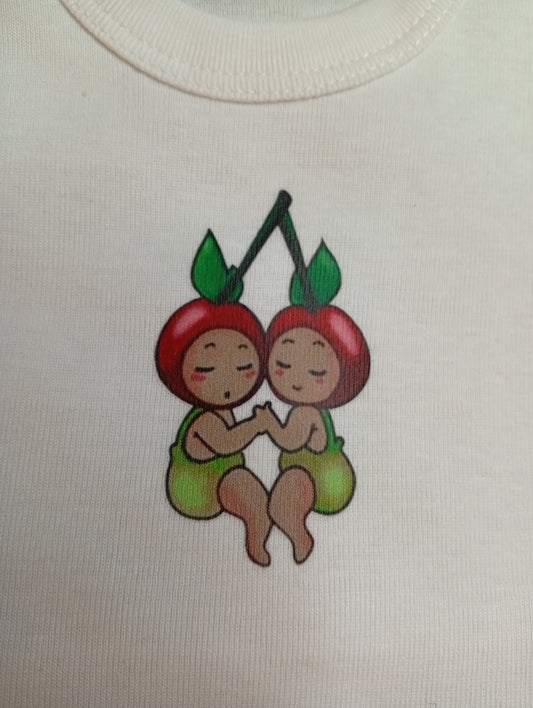 Cute cherry twins cartoon logo on white fabric, baby clothing design