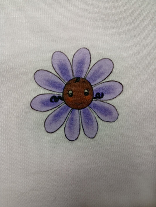 Cute purple daisy flower with a smiling face on white fabric background