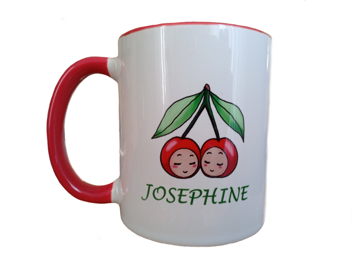 White mug with red handle, cherry cartoon illustration, and 'Josephine' text