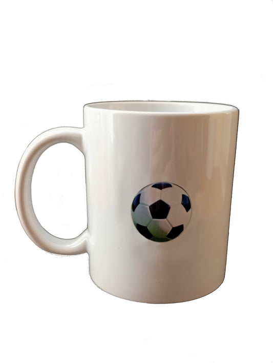 white ceramic mug with soccer ball graphic on white background